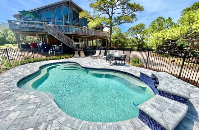 This coastal St. George Island home offers the perfect island retreat for your dream vacation.