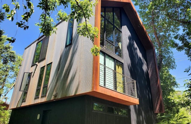 This deluxe modern new 3-story home with central AC offers the best of Bozeman!