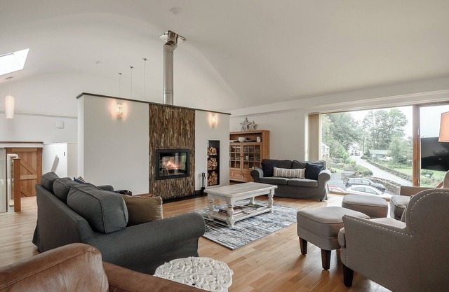This striking home is ideally located between the beach and the hills.