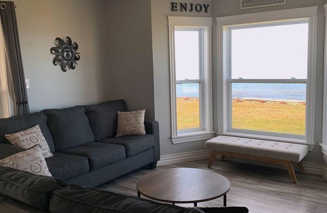 Three Bedroom Home With Screened In Porch Only Steps Away From North Shore Beach