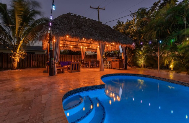 Tiki Paradise OasisnHome + Pool, Tiki Hut & 10 Min to Beach! New Outdoor Kitchen