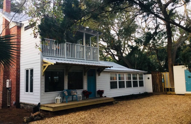 Totally renovated 1943 two bedroom two bath beach cottage just steps to beach.