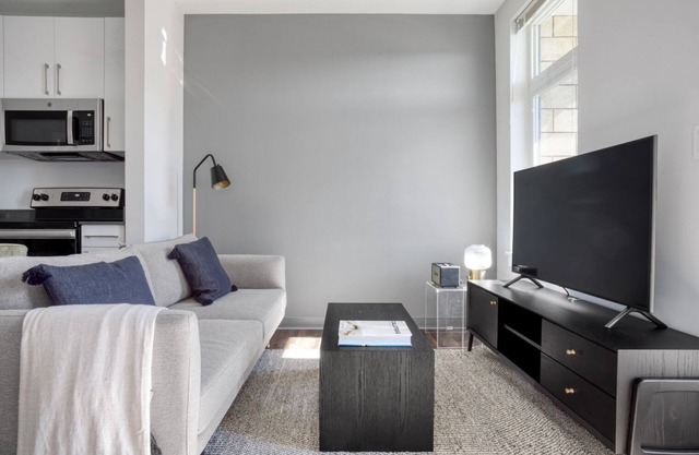 Trendy Brighton 1BR w/W/D, Gym, near T, Shops + Dining, by Blueground