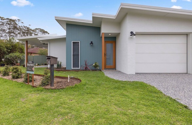 Tucked away but central to shops, restaurants, cafes, pub, clubs, is our modern contemporary house.