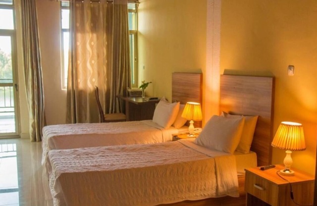Twin and intimate room with nice balcony - view on the lake