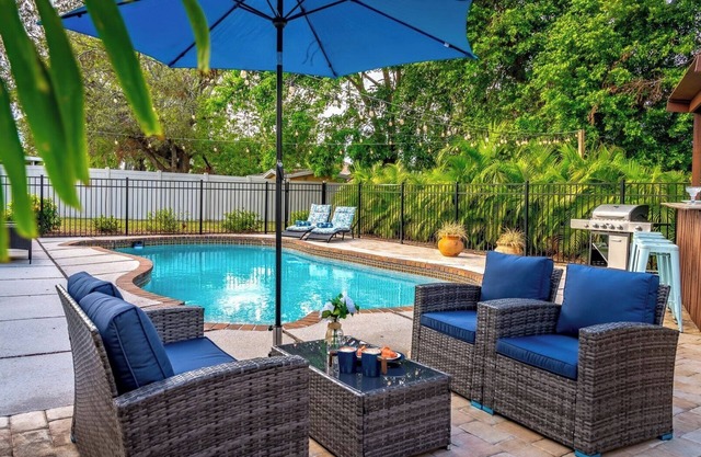 TWO BEDROOM/TWO BATH, TIKI BAR, SPARKLING HEATED POOL, MINUTES TO IMG and .