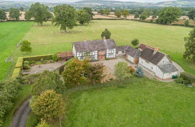 Two properties next door to each other with a games room, hot tub and bicycles