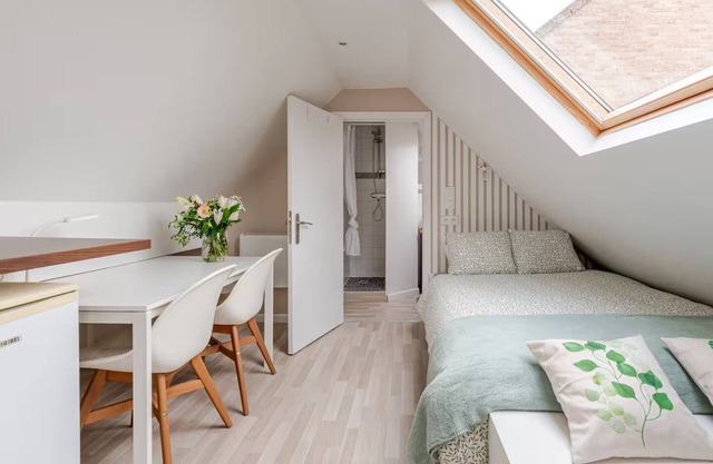 Under a perched roof, a small cocooning studio with private Spa