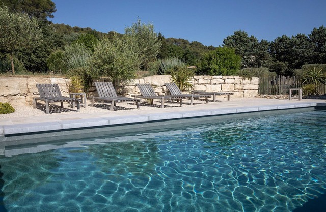 Under the wisteria of Costebelle on a wooded plot of 7500m2 private swimming pool