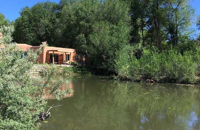 Unique Chimayo Village Adobe Casita on a wildlife pond between Santa Fe and Taos