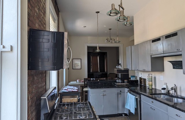 Unique Condo in Historic Building with Rooftop Deck.