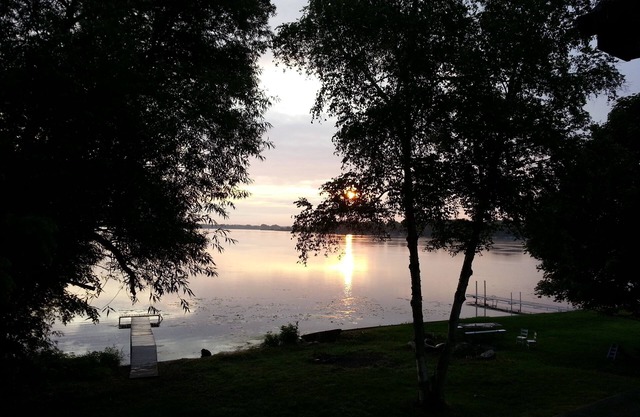 Unique Family Home Overlooking Beautiful Wind Lake With 117' Lake Frontage