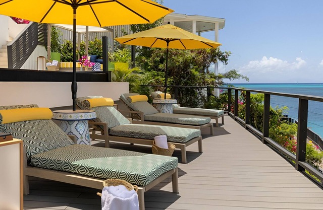 Unwind in a Stylish Beachfront 4 Bedroom Villa with Panoramic Sea Beauty