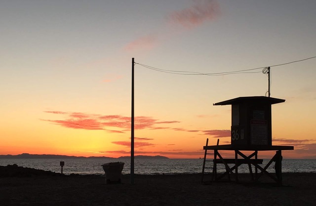 Updated Balboa Peninsula duplex bungalow…steps from the sand!