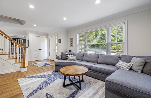 Updated home with canal & hot tub in backyard. Close to everything!