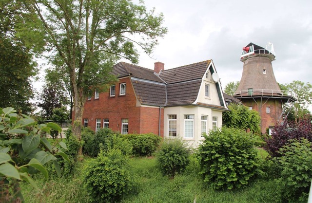 Uttumer Mühle: Aletta - Gemütliche Erdgeschosswohnung im Müllerhaus der Uttumer Mühle