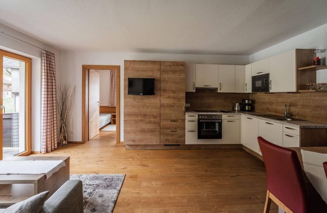 Vacation apartment "Almrausch" - Guesthouse Fohringer