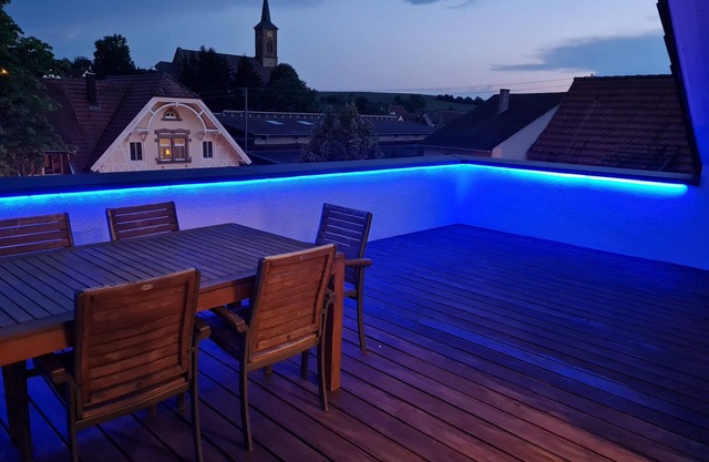 Vacation apartment "Penthouse Tiefenbach" with private wooden terrace on the roof and WLAN