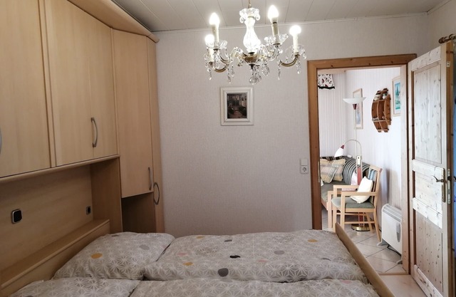 Vacation apartment with large garden with solar-heated swimming pool with terrace and sun loungers