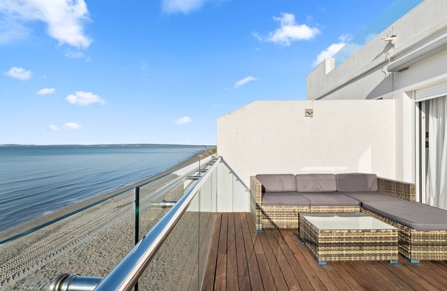 Vacation Home "Casa En La Orilla De La Playa" with Balcony, 2 Private Terraces & Wi-Fi