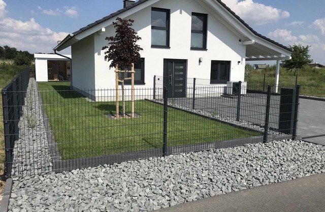 Vacation home Oskar on the lake with private beach for 4 adults, fireplace, boat and sauna