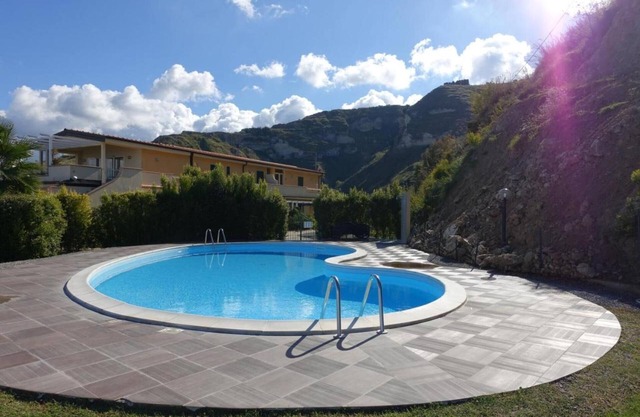 Vacation Home "Terrazzo A9" with Sea View, Shared Pool & Wi-Fi