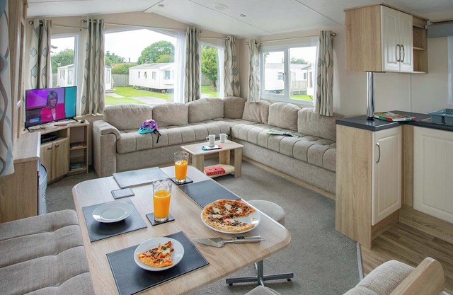 Very comfortable, modern and contemporary caravan with one double and two twin.