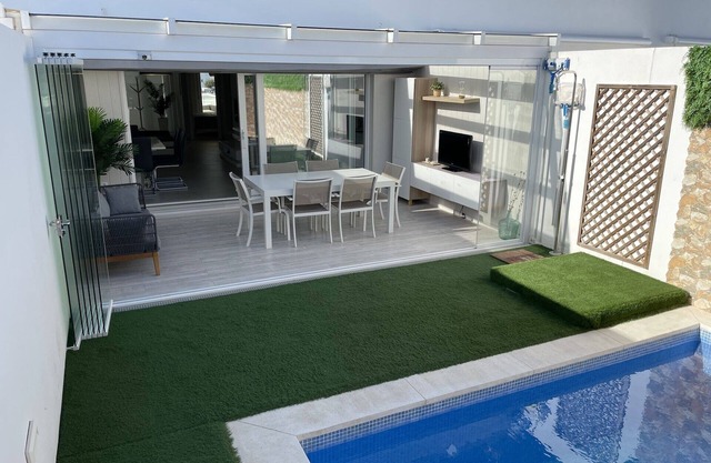 Very modern and tastefully furnished terraced house with small private pool