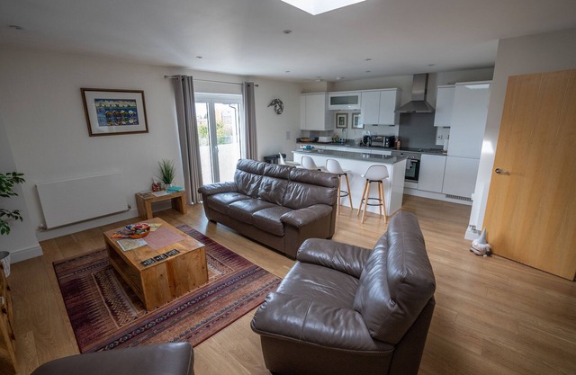 Very popular modern 2 bedroom apartment sleeps 4 located opposite Deal Pier.
