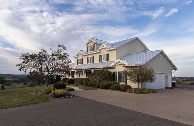 Villa in the heart of Amish Country with amazing rooms, wide porches, beautiful views, and walking distance to Berlin's dining and shopping.