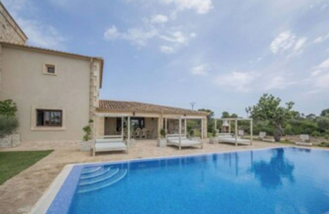 Villa with pool in front of Es Trenc