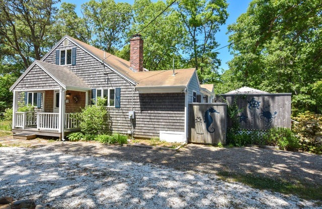 Walk to bay-side beach from this updated, cozy Cape Cod getaway