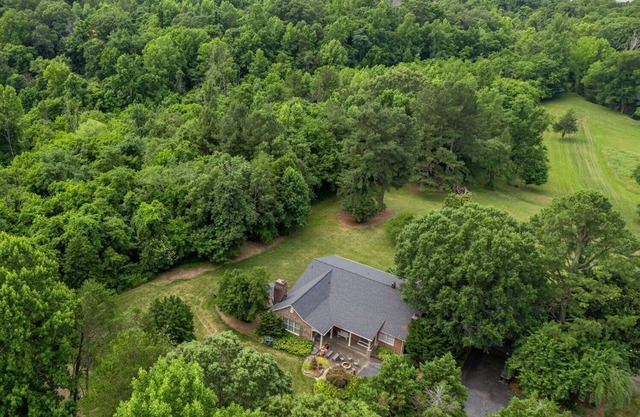 Waterfront home with 5 Acres! 4 bedrooms 3.5 bathrooms