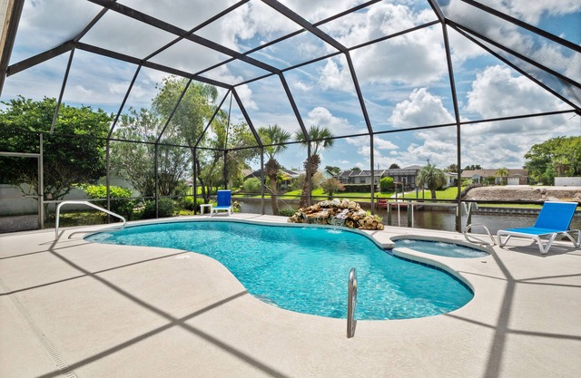 Waterfront Home with Pool, Hot Tub, Dock, Game Room & 10 minutes to the Beach
