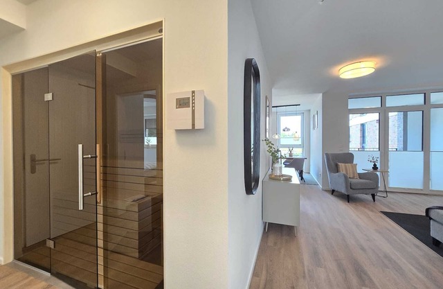 Weiße Düne - stylish living comfort with sauna & balcony at the Norder Marina
