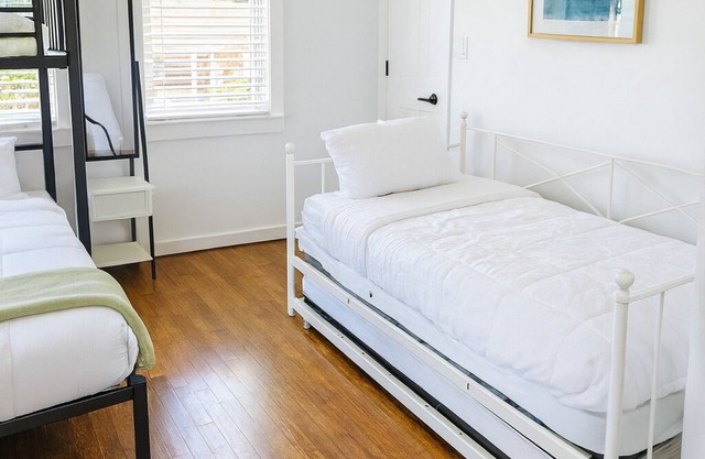 Welcome! This stylish and spacious three-story gateway