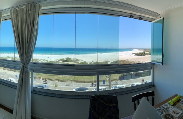 Wonderful fit. in front of Praia Grande with stunning view!