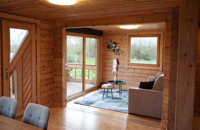 Wooden cottage for 6 people located on the edge of a private pond.