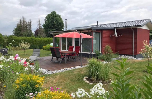 Wooden house with large garden and sauna "dogs welcome"