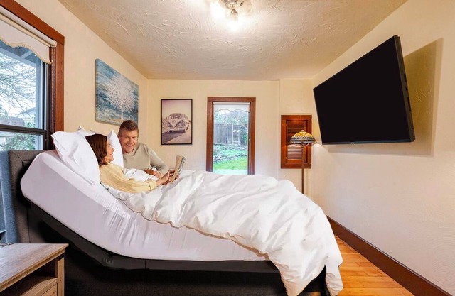 You deserve the best! Adjustable king bed with premium mattress, massage chair