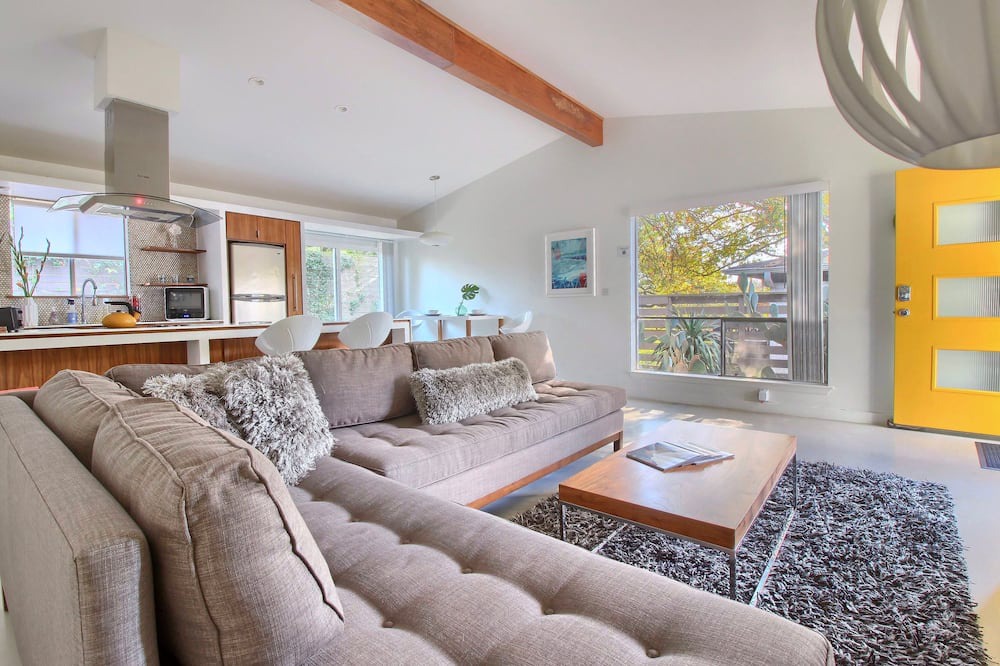 South River City House | Stylish Mid Century w Fenced Yard by Lodgewell
