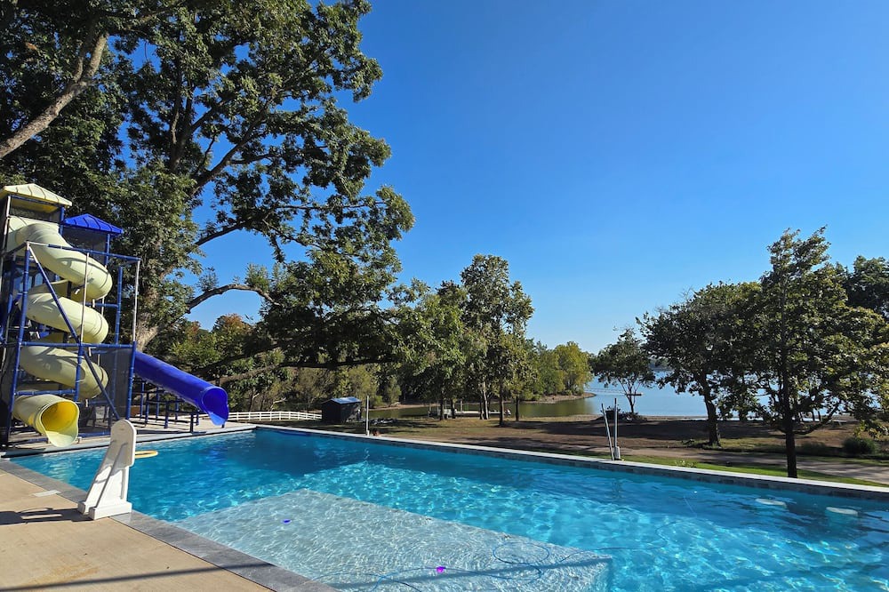 Grove House | Giant10-bedroom lakefront home with large pool, hot tub, and dock