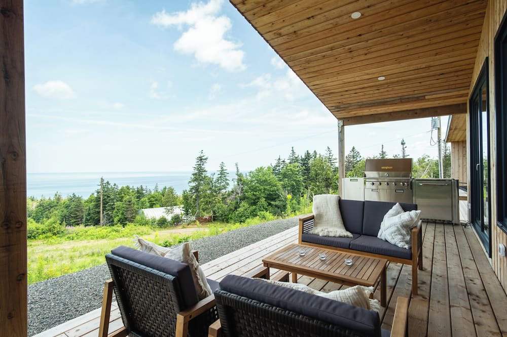 Inverness House | Modern 4 Bedroom, 4.5 bath home near Cabot Links with ocean views and sunsets.