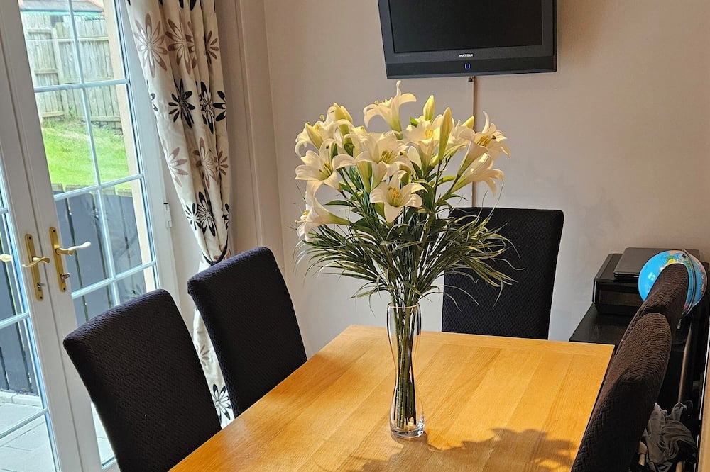 Newcastle House | Semi detached home with garage. 3 bedrooms, 3 bathrooms. Treadmill in garage.