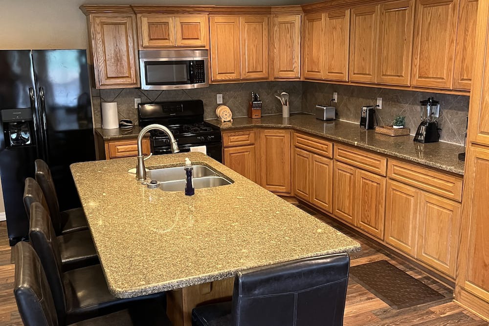 Board Camp House | Ride to the ATV trails from this Spacious 4-bedroom house with RV hookup!