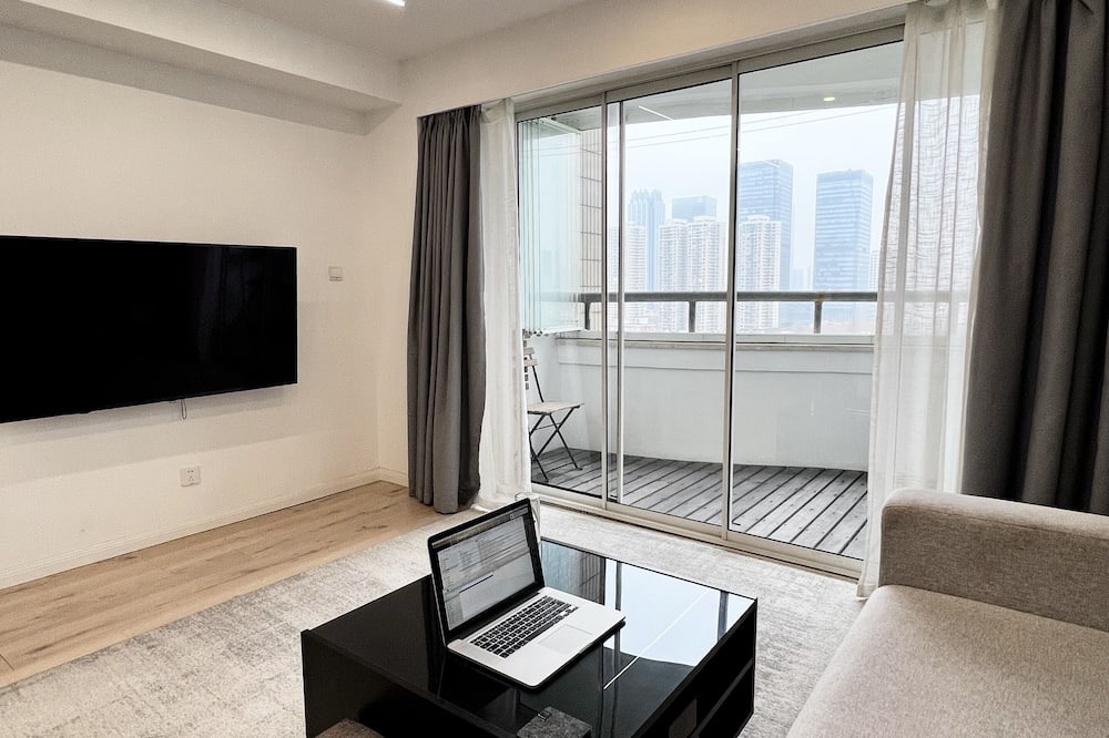 Huaihai Road Commercial Area Apartment | peaceful urban retreat in a stylish minimal apartment with views across the city