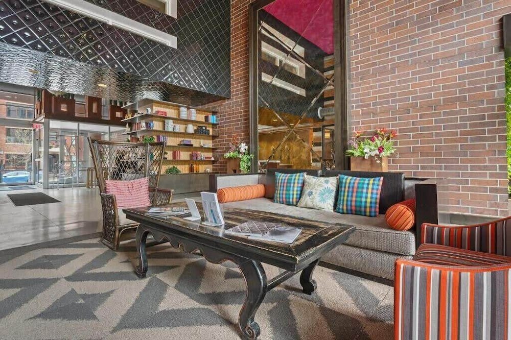 Mill District Apartment | CozySuites Mill District with pool, gym #01