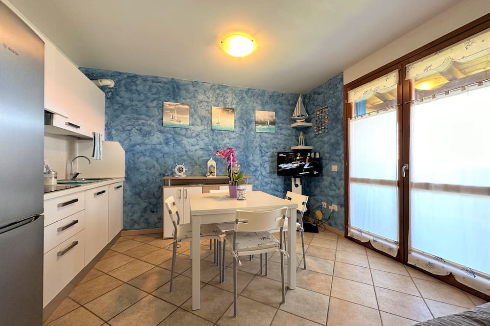 Aprilia Marittima Apartment | Flat in a colourful residence with pool