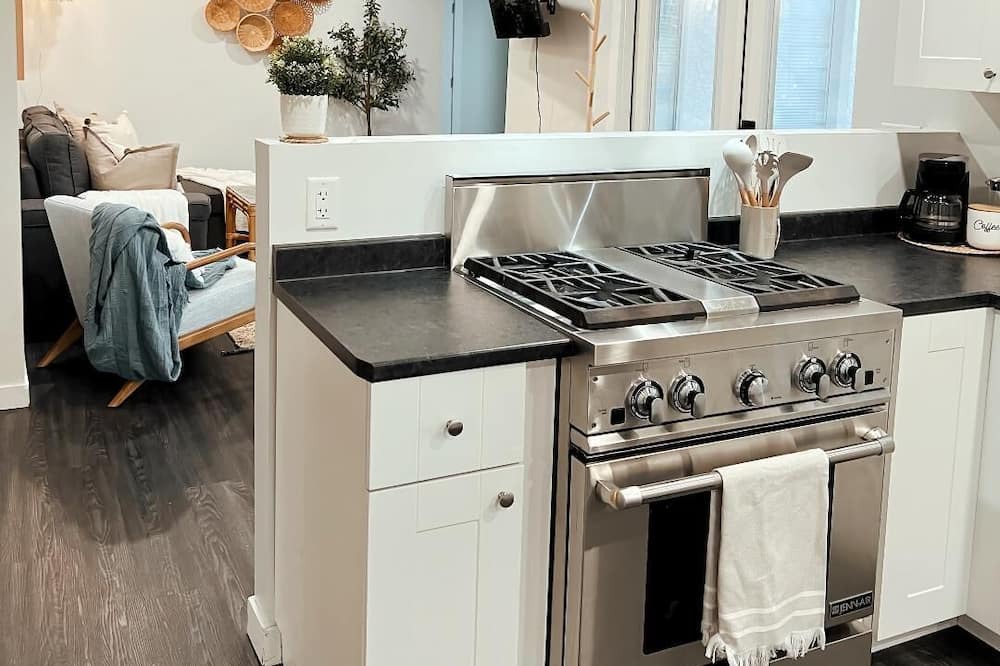 Kamloops House | Guest suite with cozy outdoor fire place and minutes from all local amenities