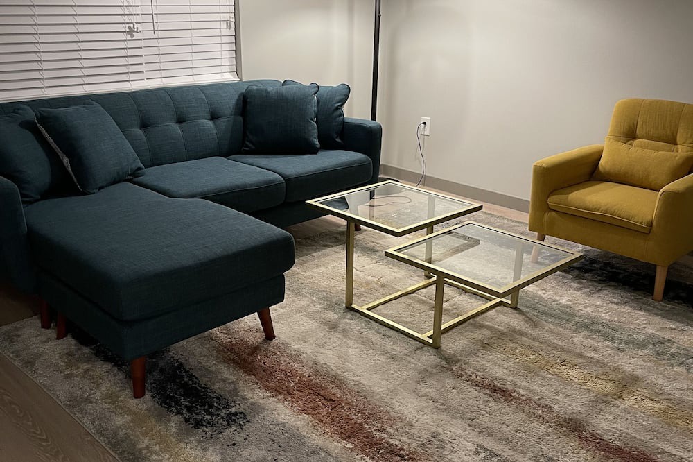 Town Center Apartment | Yellow Serenity: A perfect balance of serenity with nearby entertainment.